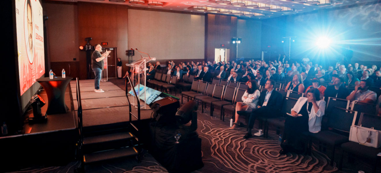Man speaking on a stage