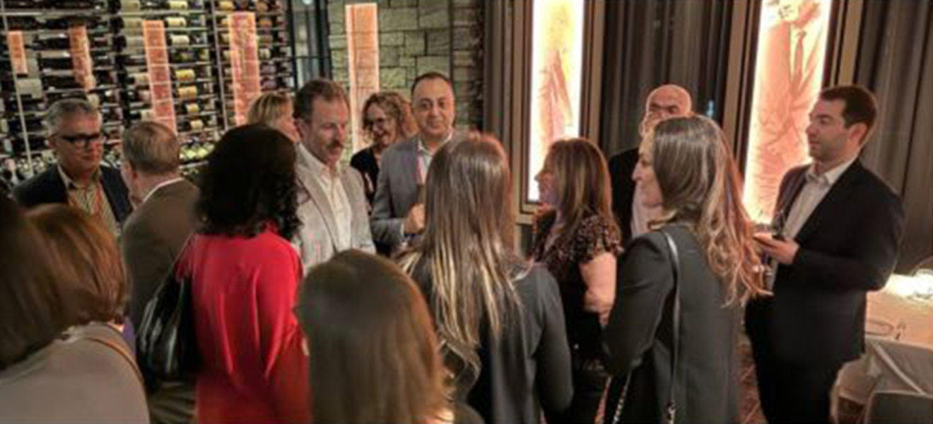 Photo of group speaking together in a room
